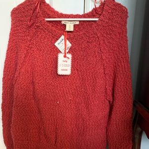 Marshall’s red sweater